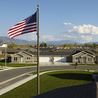 American flag at the community entrance