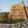 The Springs at Logan River entrance sign with tulips