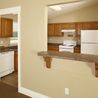 Kitchen with oak cabinets and breakfast bar