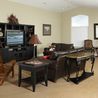 Community center lounge with seating and entertainment center