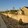 Walking path along the landscaped perimeter wall