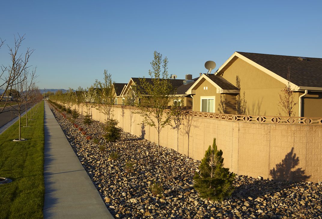 Walking path along the landscaped perimeter wall