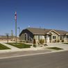 Home and flagpole with mountain views